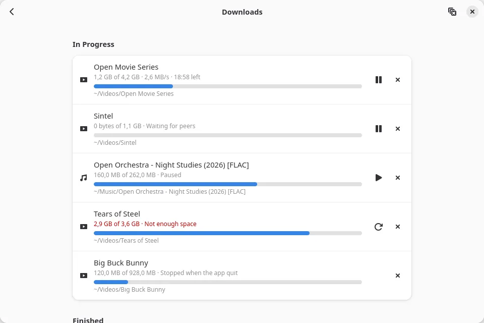 The Downloads page with progress bars, pause and resume for several saves
